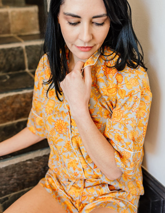 Discover pure bliss with our Daffodil Yellow Silk Short Pajamas. Immerse yourself in luxurious comfort and timeless elegance as you lounge in style. Crafted from the finest silk, these pajamas redefine relaxation. Elevate your sleepwear collection with sophistication and indulgence.